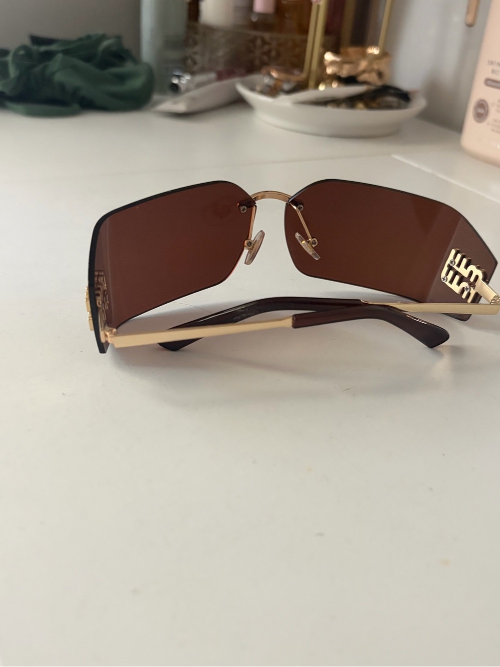 Brown Rimless Square Sunglasses with Gold Accents